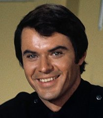 Oficial Jim Street (Robert Urich)