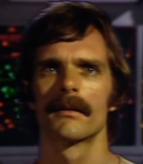 Devon (Keir Dullea)